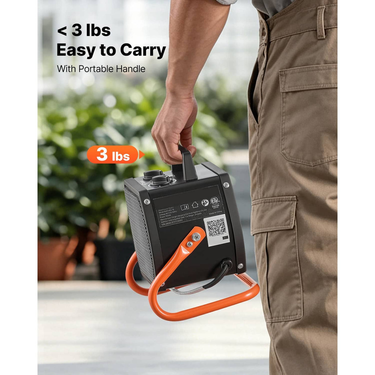 Electric greenhouse heater with portable handle, orange frame, and black front grille