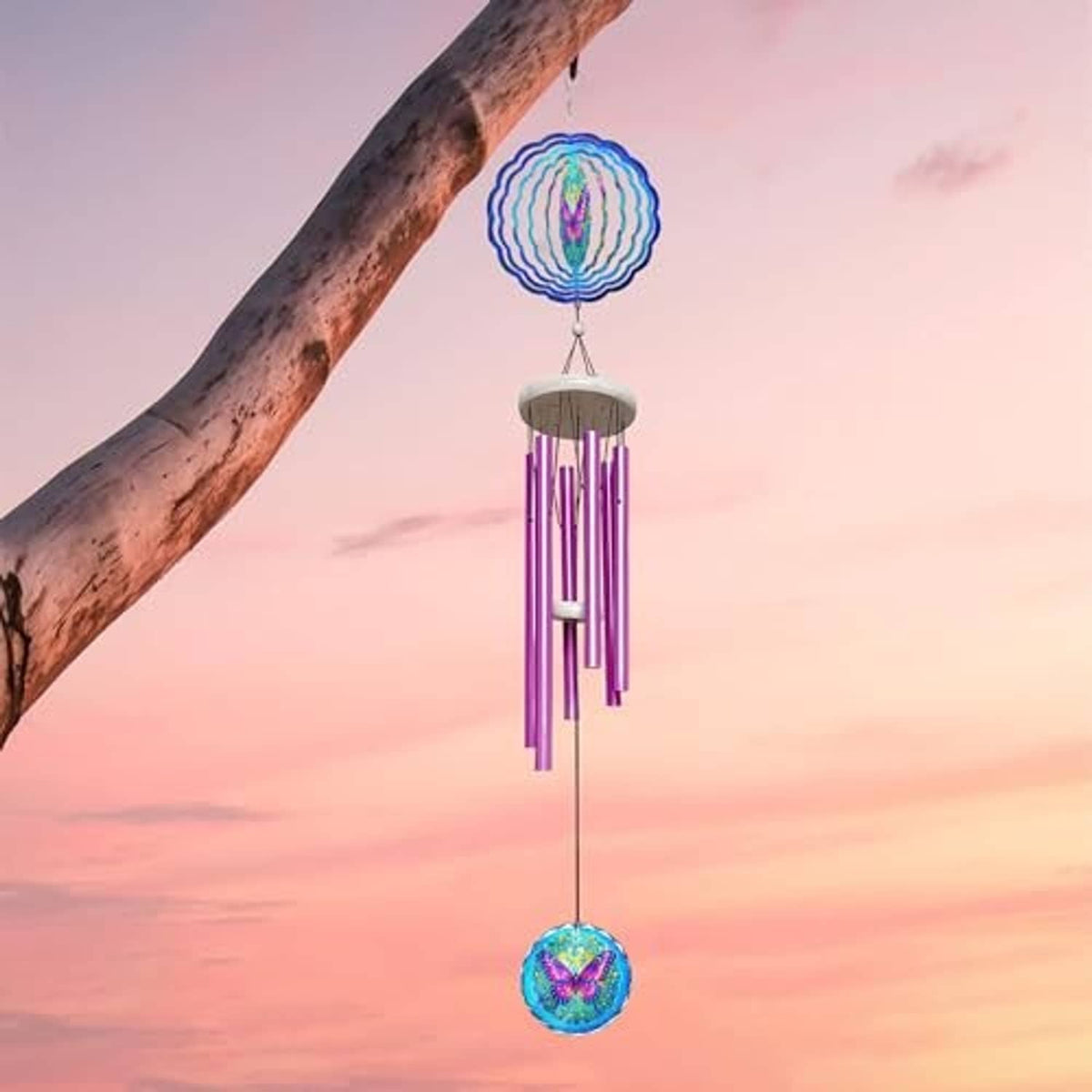 Purple butterfly wind chime spinner with blue circular top and multicolor hanging disk outdoors