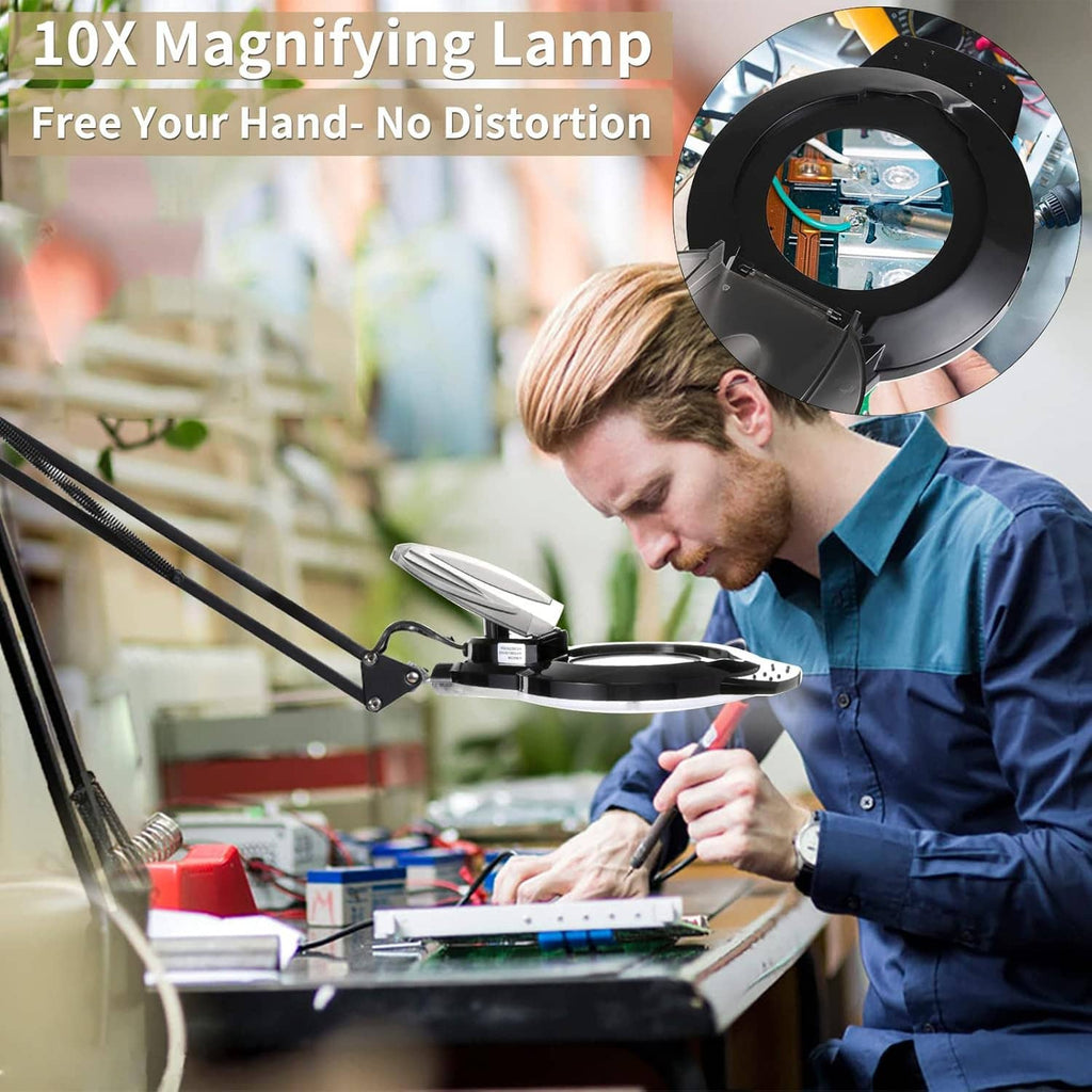 LED magnifying lamp on workbench with circular lens over detailed task area