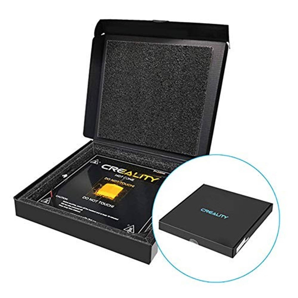 Heated printer bed kit in open case with foam insert and small control box