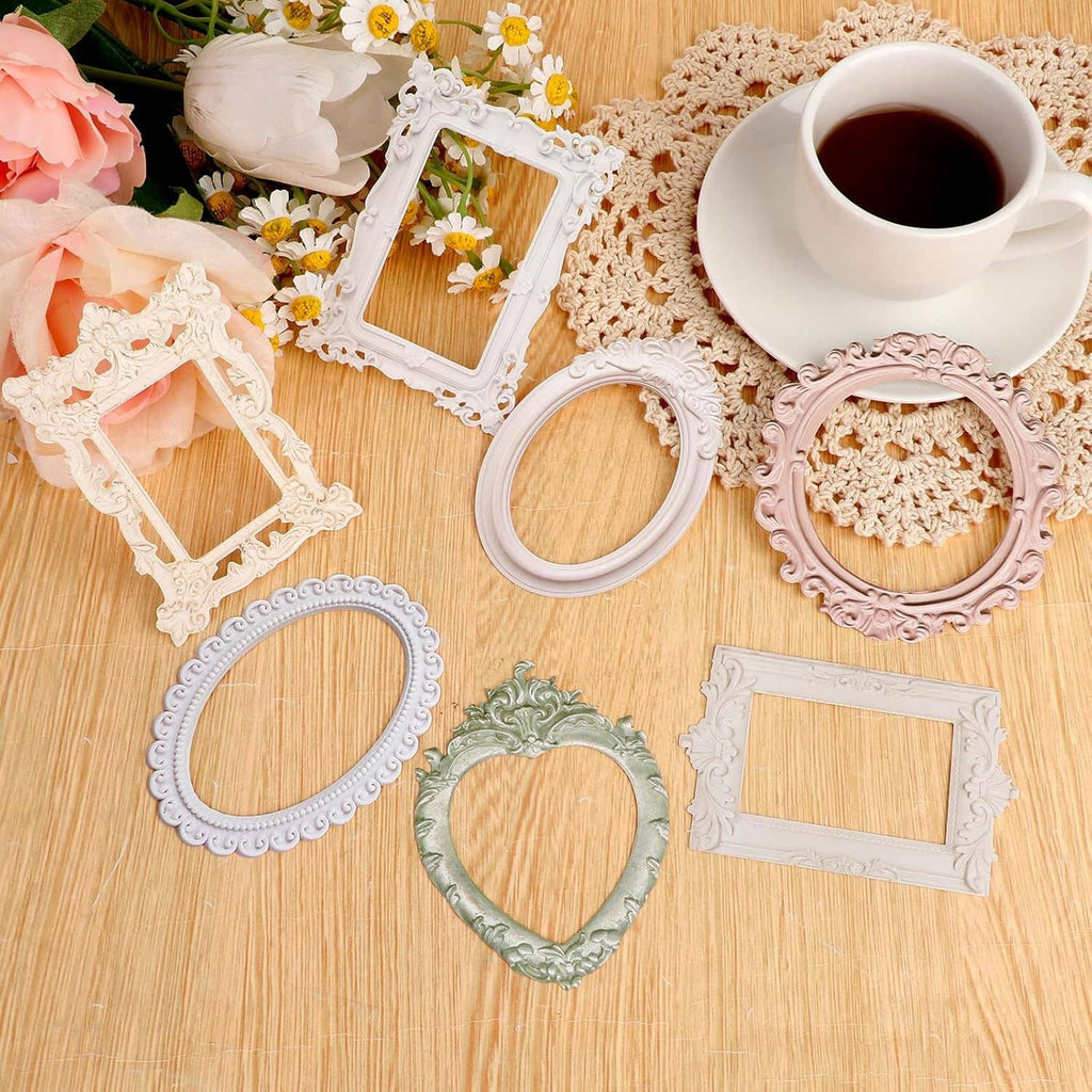 Lace scrapbook picture frames and borders paper pieces in pastel colors, oval and square shapes.