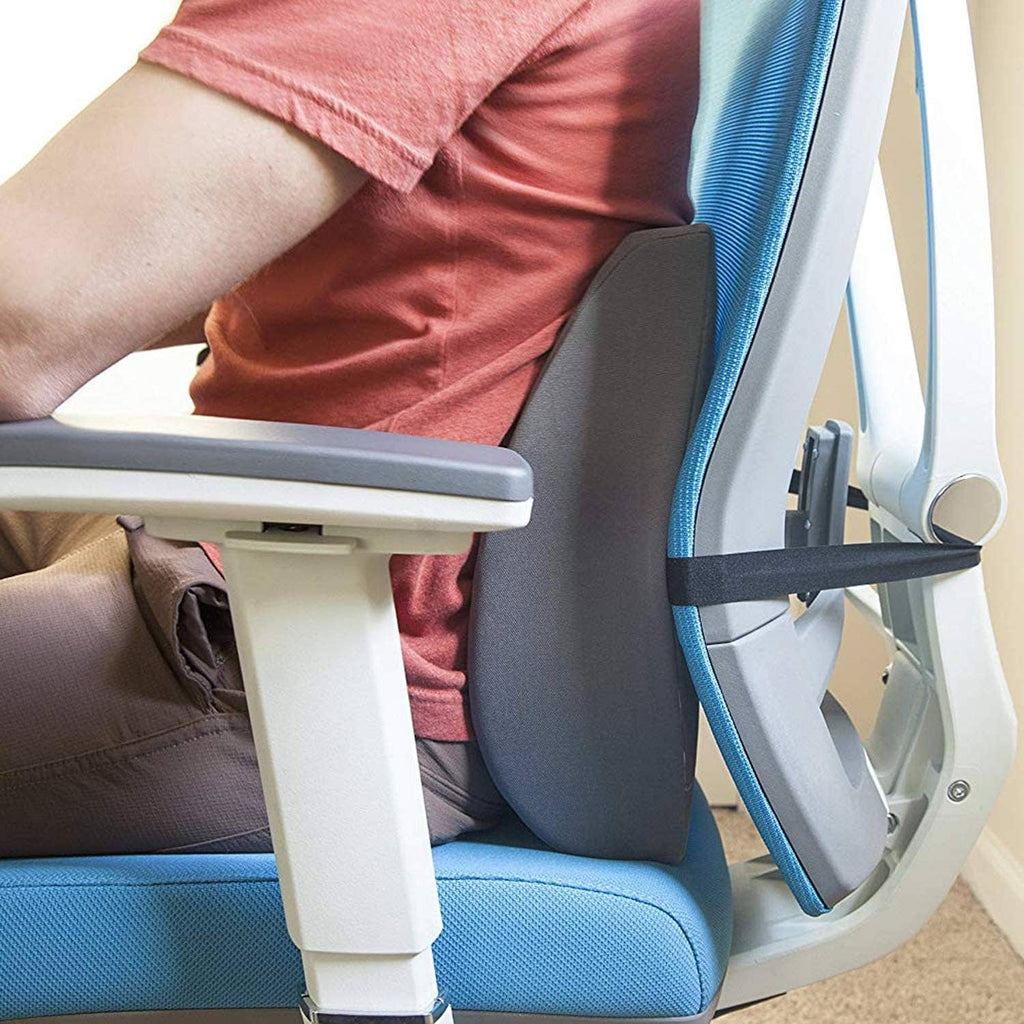 Gray lumbar support chair pillow worn against a seated back for added support