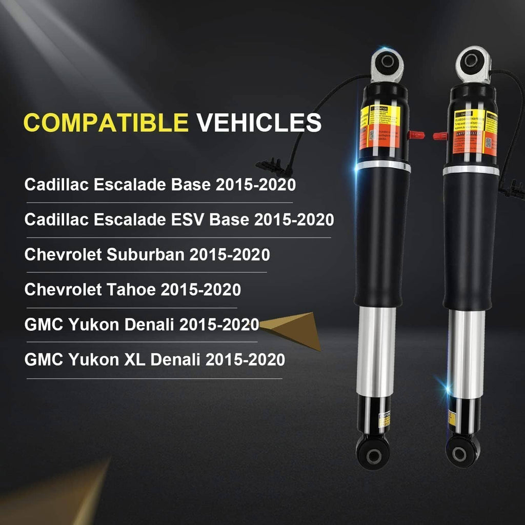Rear air shock absorber pair with yellow warning labels, black bodies, and silver rods