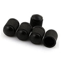 Set of 5 black ribbed plastic valve stem caps, rounded tops and open ends