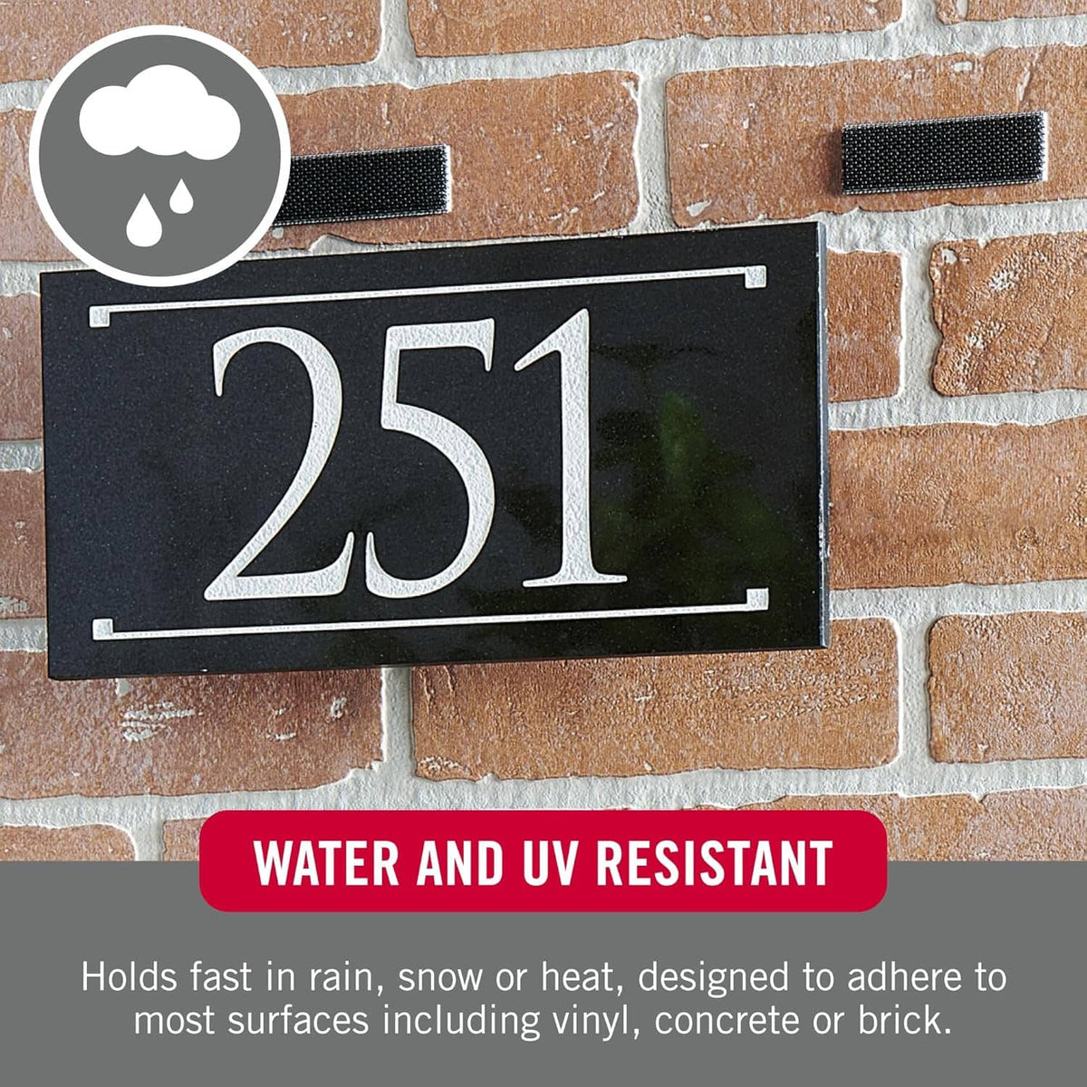 Extreme Lock mounting strips on brick: water and UV resistant adhesive hook pads