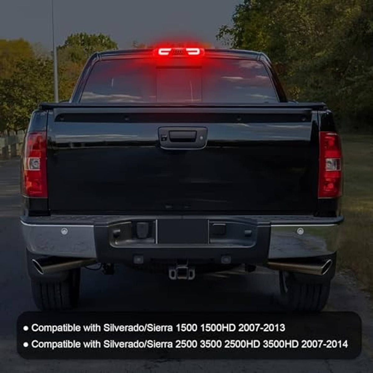 Rear LED third brake light installed on truck, showing red illuminated light pattern