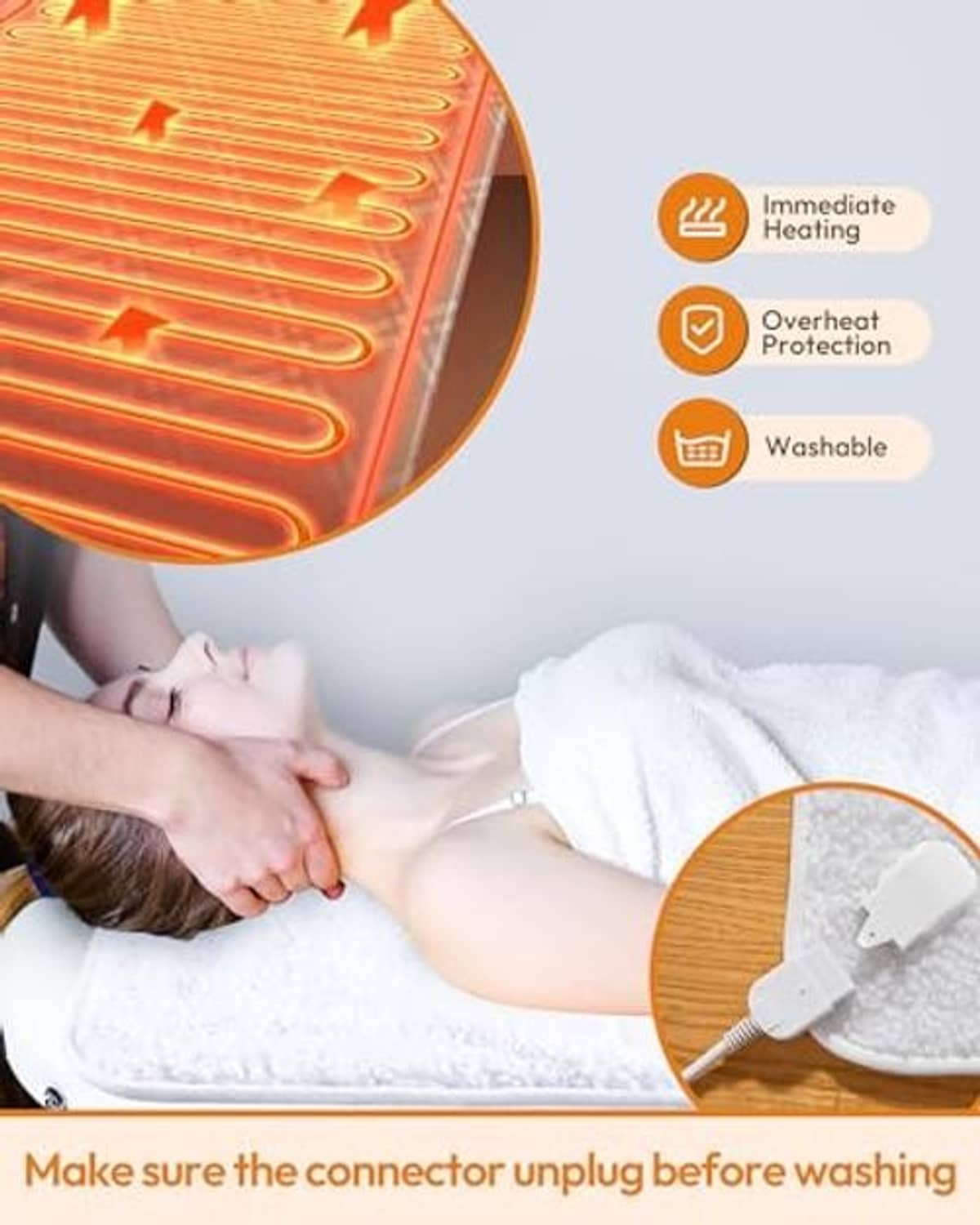 Heated massage pad with visible orange heating element layer and power cord connection.