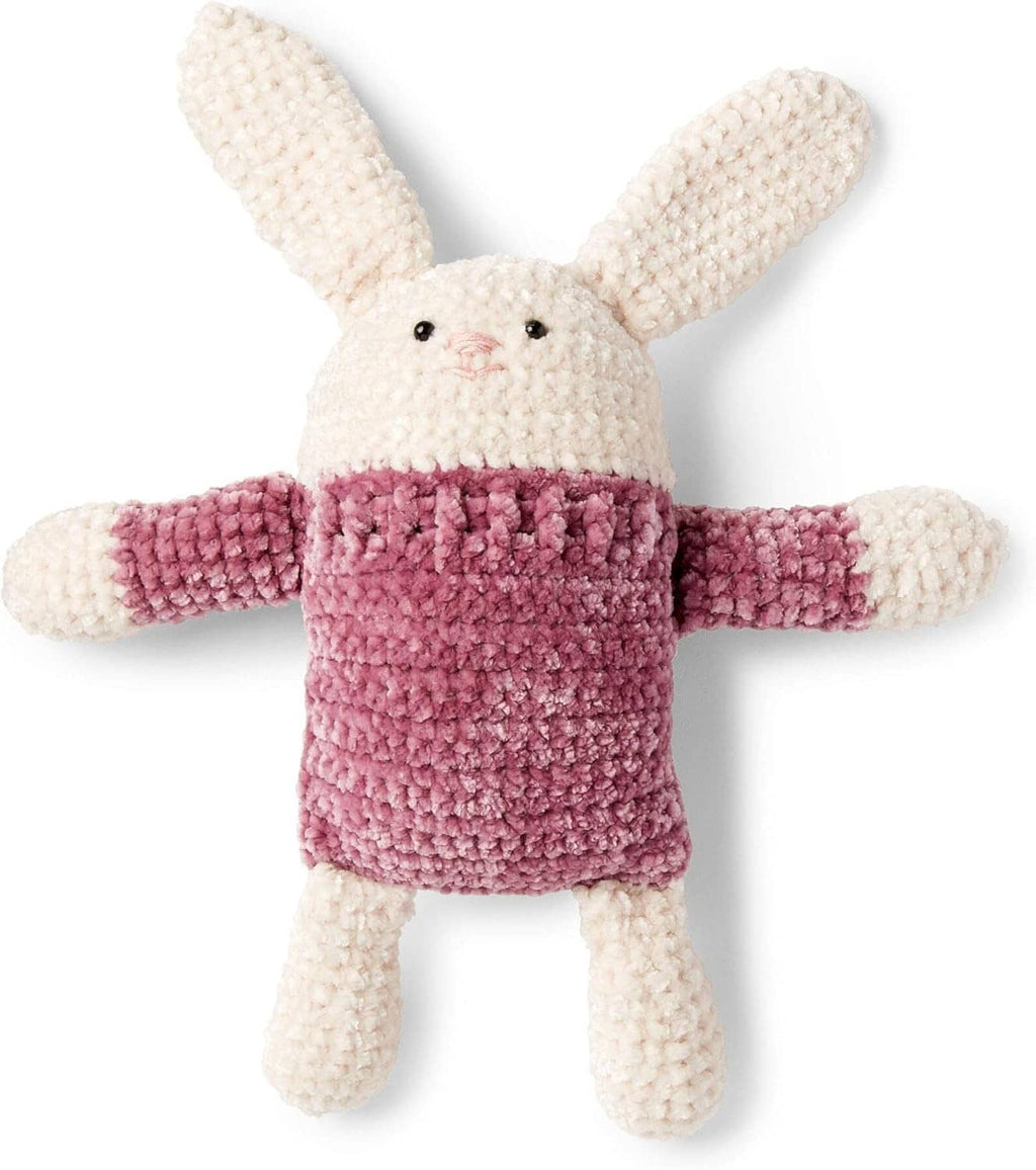 Knit bunny plush with white ears and pink body, arms and legs out
