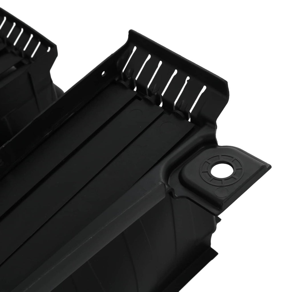 Close-up of black radiator shutter assembly with circular opening and vent fins