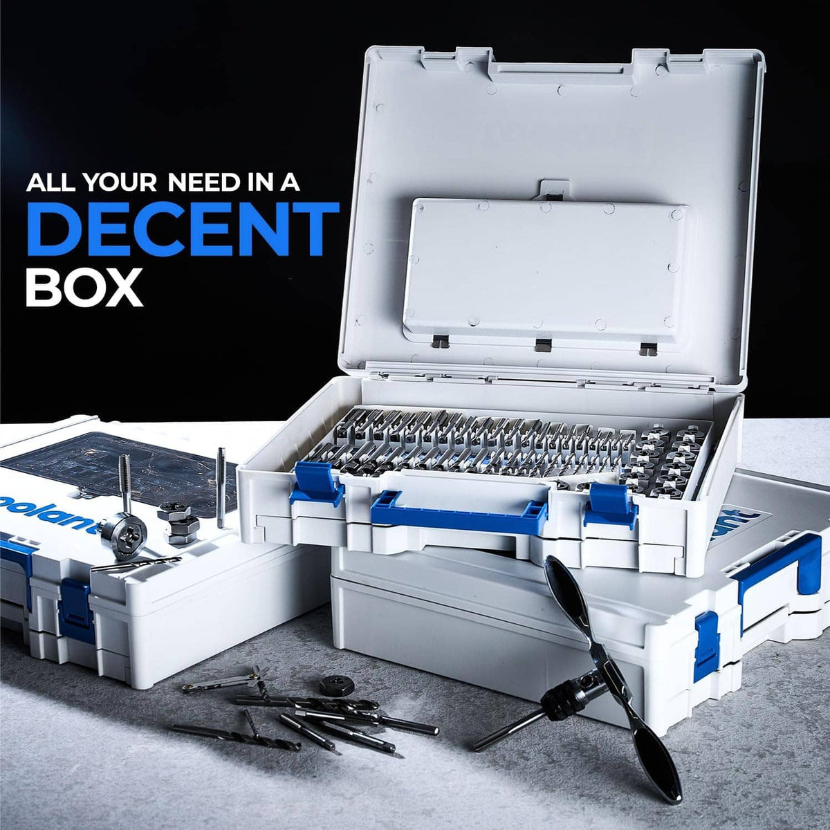 Ratcheting tap and die kit open in white case with blue clamps and tools