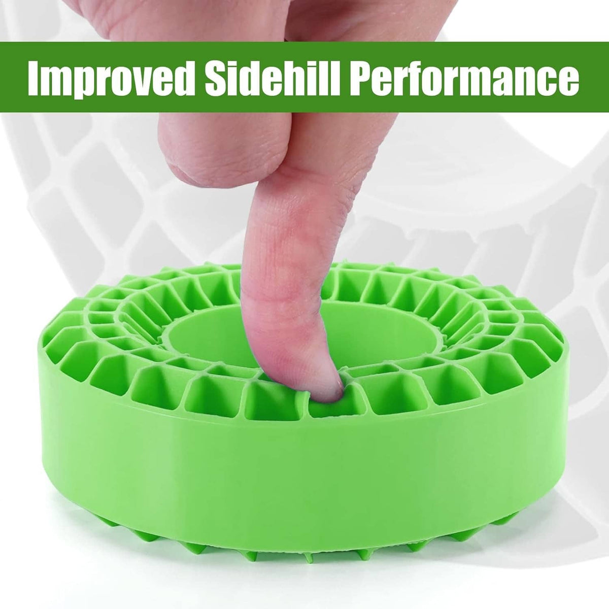 Green silicone rubber tire insert with honeycomb tread, held by hand