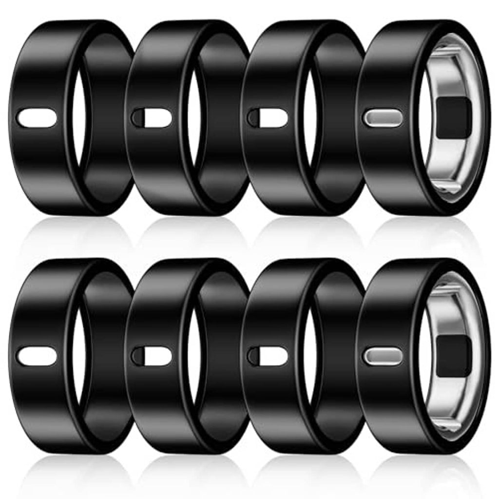 8-pack black TPU ring covers, angled view with metal inner rim and side notch