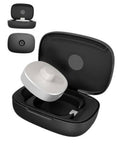 Black charging case open with earbuds docked, visible charging contact points