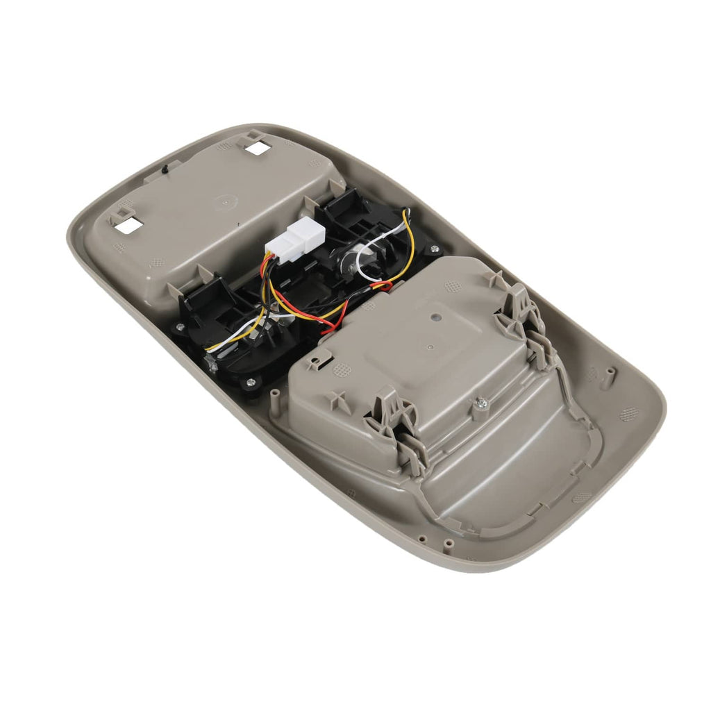 Beige overhead console dome light housing with internal wiring and clips
