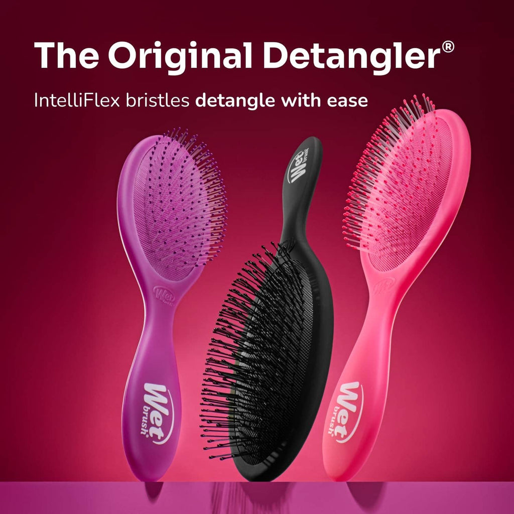 Detangling brush set with purple, black, and pink oval heads and bristles
