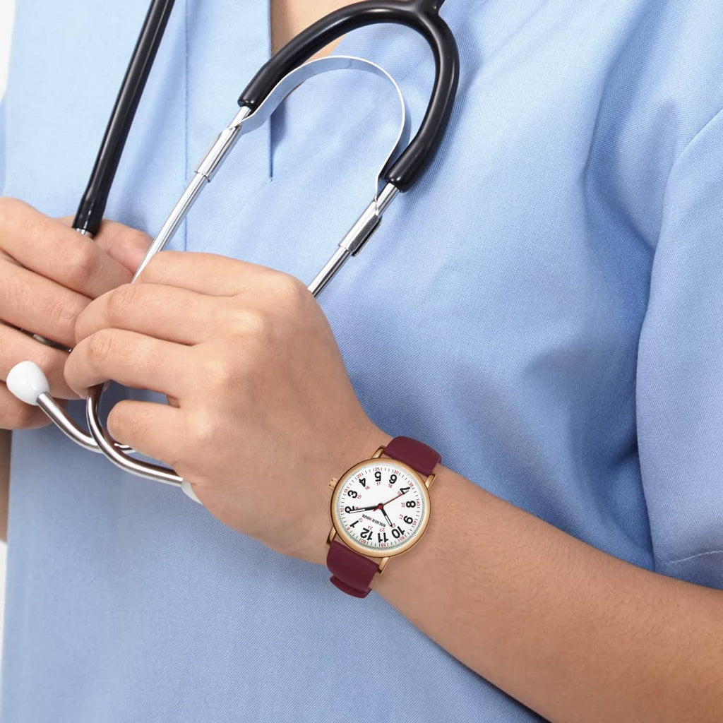 Nurse watch on wrist with wine-red silicone strap and rose-gold bezel, white dial