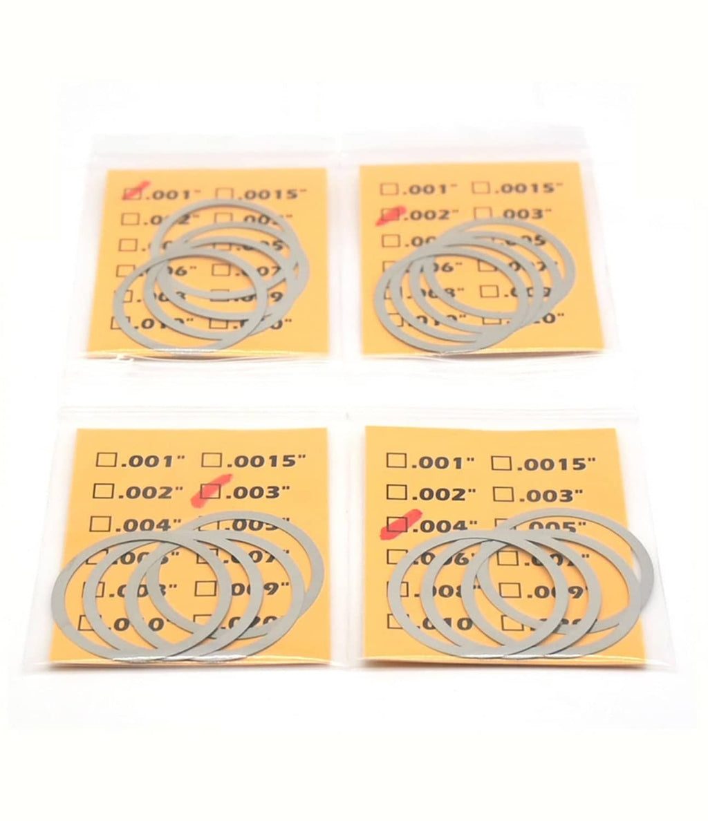 Barrel nut shim kit with labeled blister packs and stacked silver ring shims