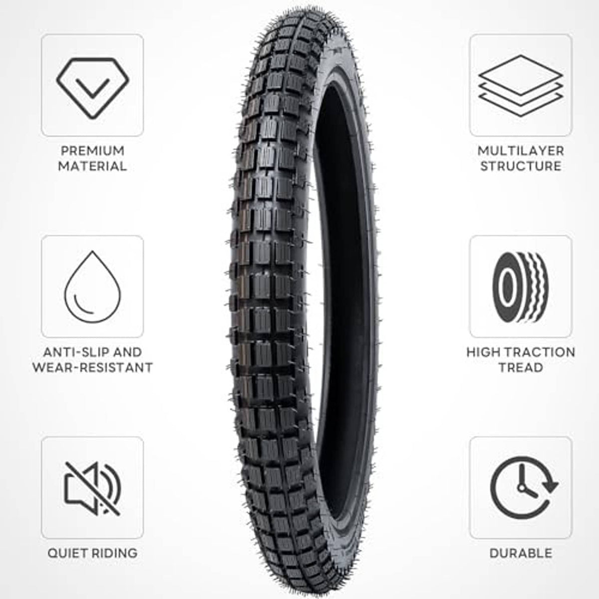 Dirt bike tire with aggressive tread pattern and visible sidewall