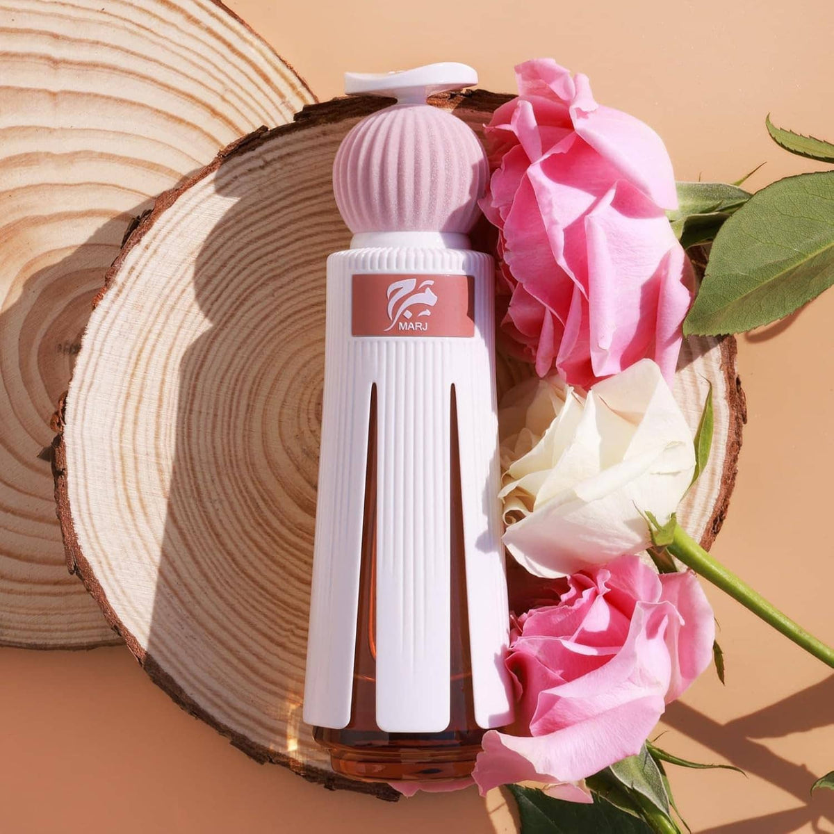 Extrait de parfum spray bottle, white with rose-pink ribbed cap, with pink roses