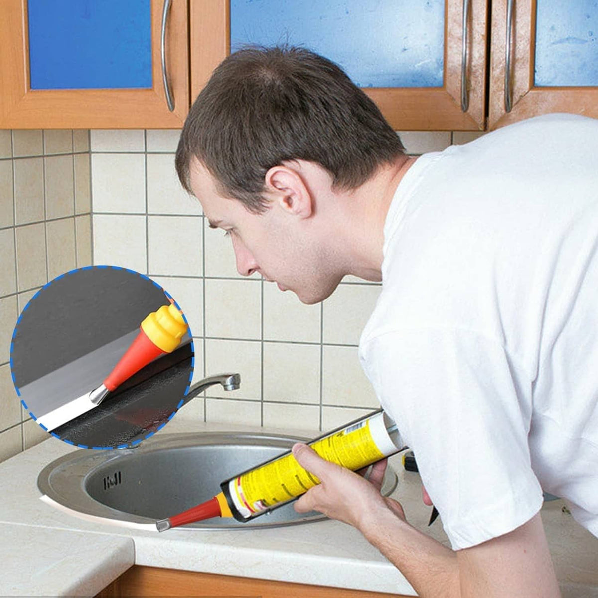 Person applying caulk along a sink edge using a red finisher nozzle tip and yellow collar