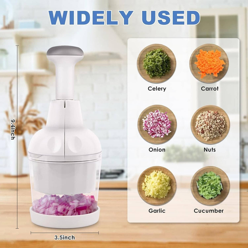 White food chopper with clear container showing chopped onion and garlic
