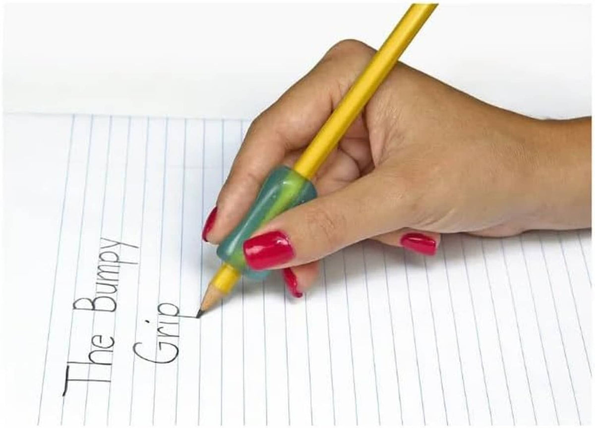Pencil grip in use: hand holding yellow pencil with green-tipped writing grip