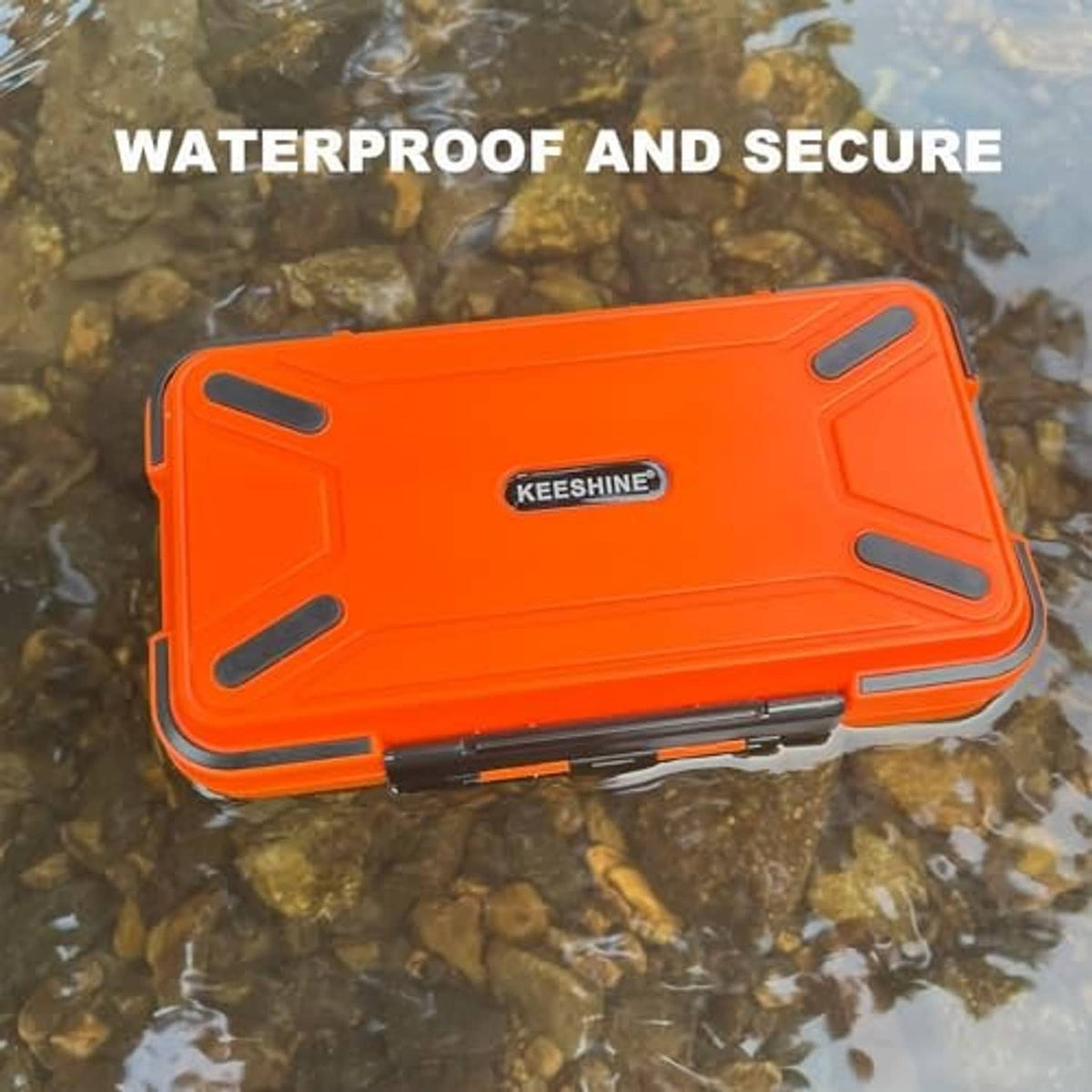 Orange floating fishing tackle box with black latch, on water