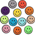 Set of round chenille smiley face iron-on patches with teal, light green, pink, and gray