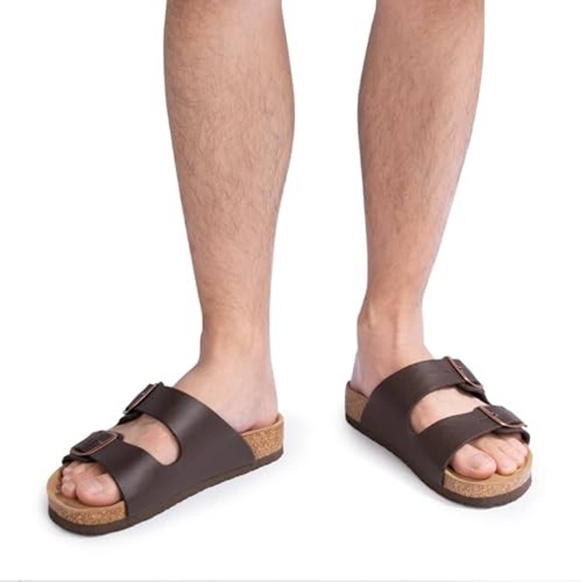 Mocha men's slide sandals on model feet with two adjustable buckle straps