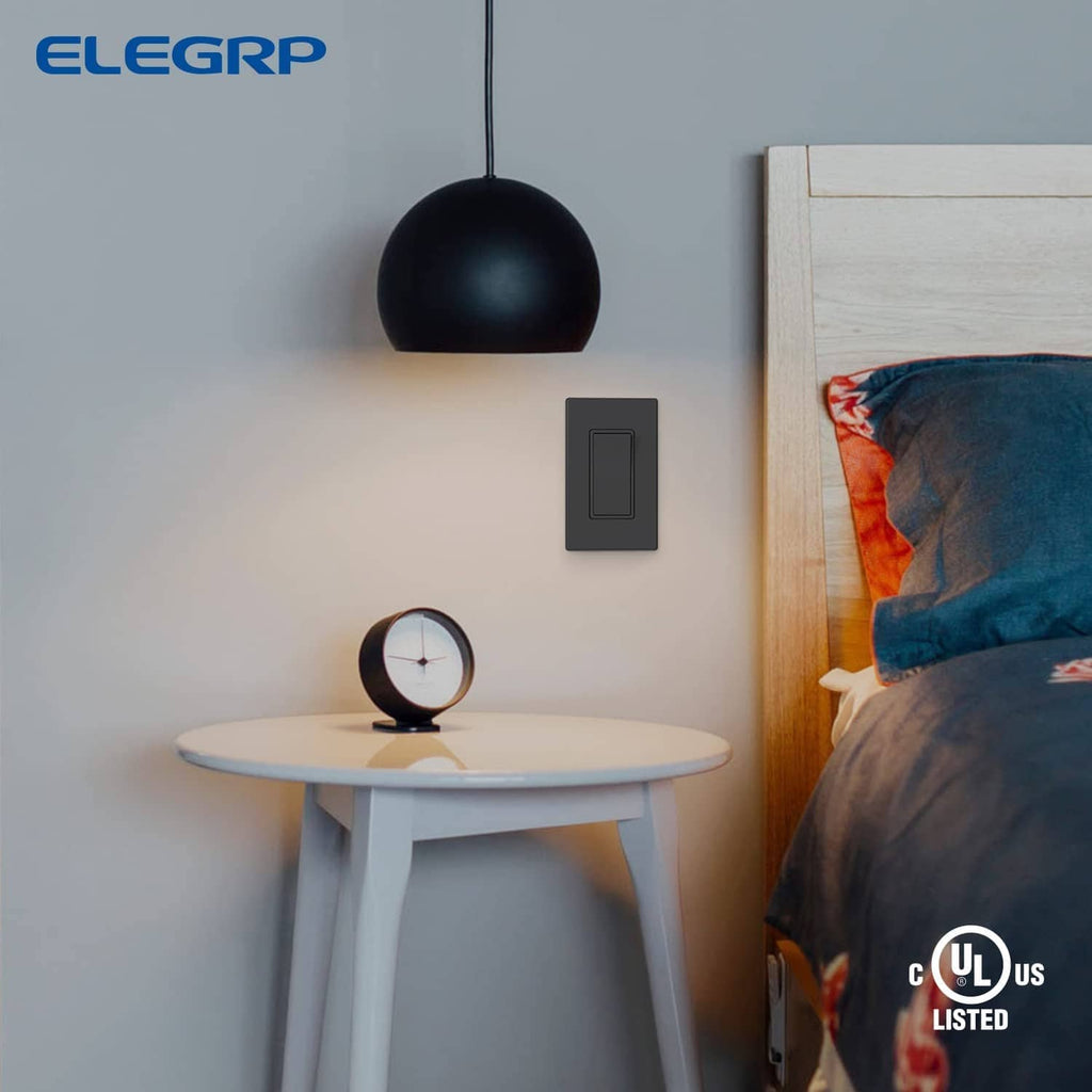 Matte black single-pole rocker switch on the wall
