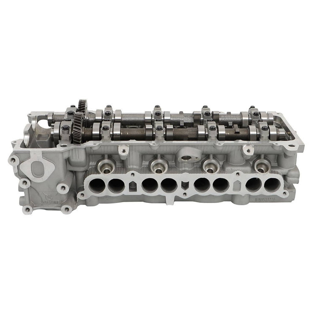 Cylinder head assembly with camshafts, rocker arms, and intake/exhaust channel openings