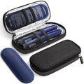 Insulin cooler travel case open with black shell, reflective lining, and blue gel pack