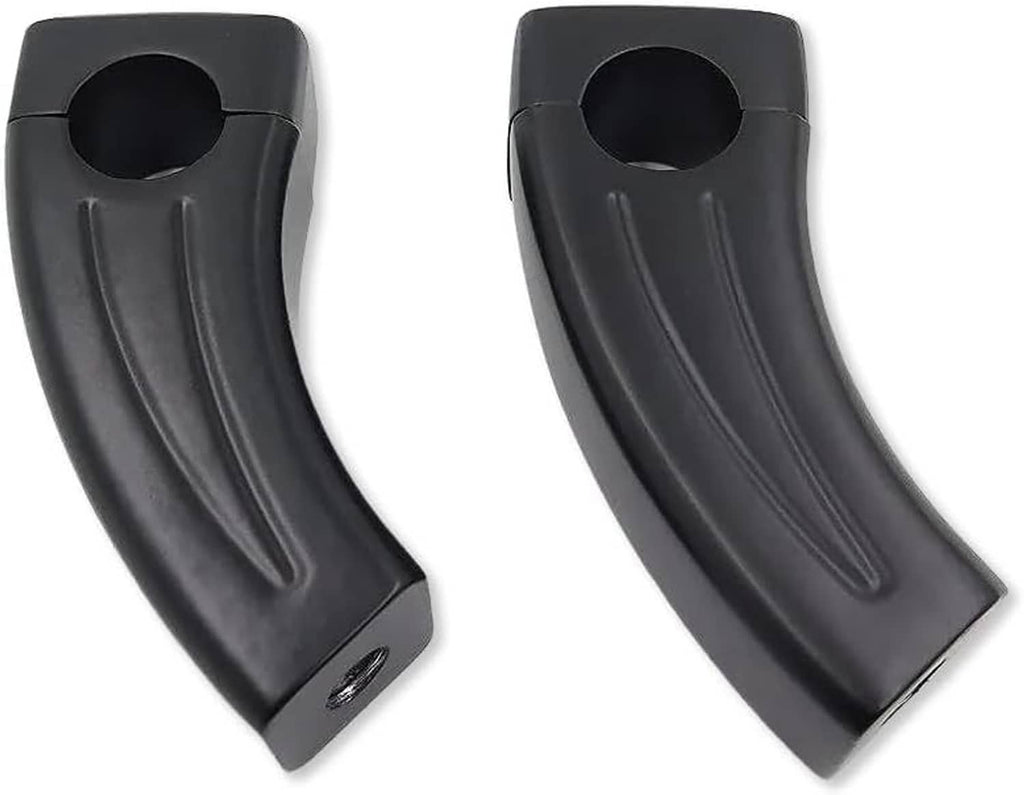 Black handlebar riser block pair with circular mounting hole and curved front profile