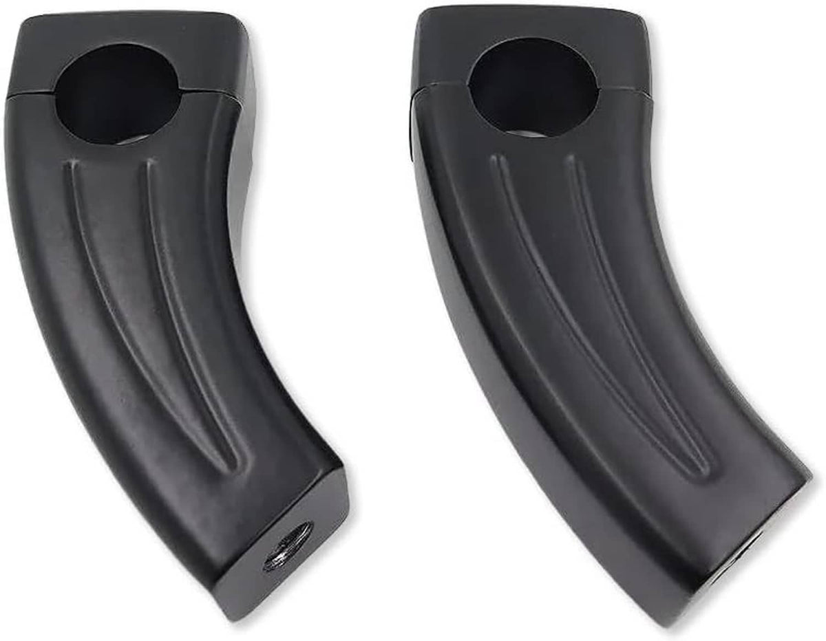 Black handlebar riser block pair with circular mounting hole and curved front profile