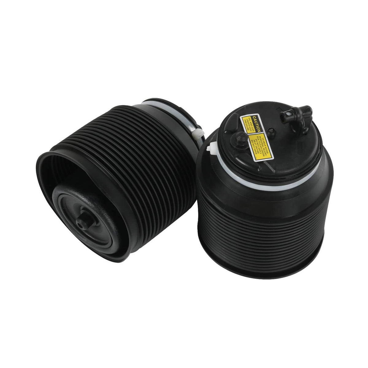 Black air suspension spring bags with visible ports and top caps with yellow warning labels.