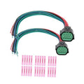Two 14-pin headlight connector pigtails with multicolor wiring and green plug ends
