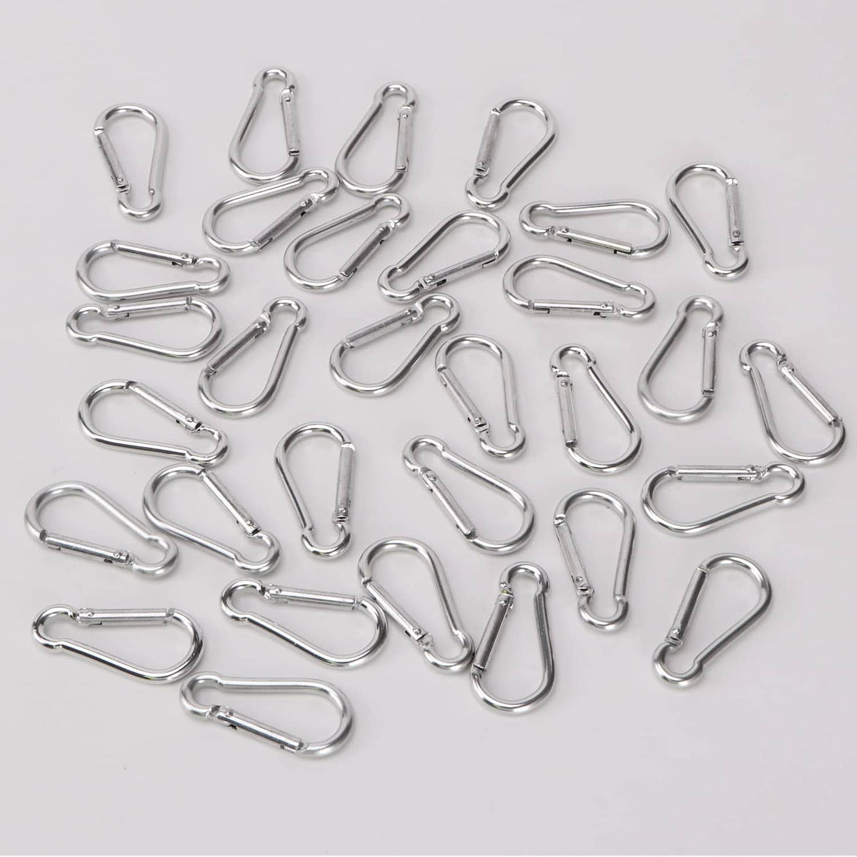 Pack of small silver mini aluminum carabiners with spring-loaded clip gates