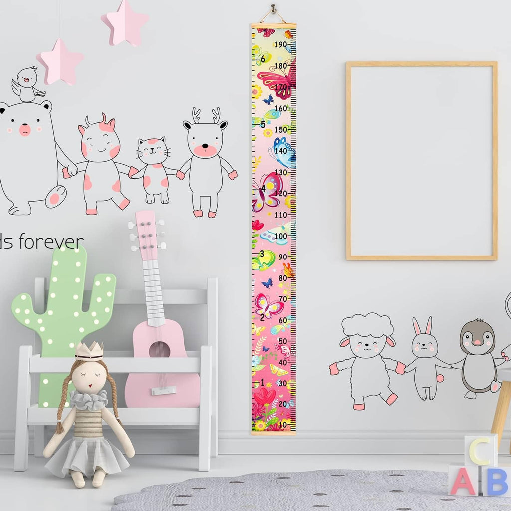 Kids growth chart banner hanging on wall with butterfly height scale