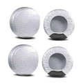 Set of 4 white tire covers, round shape with central opening, front and side angles