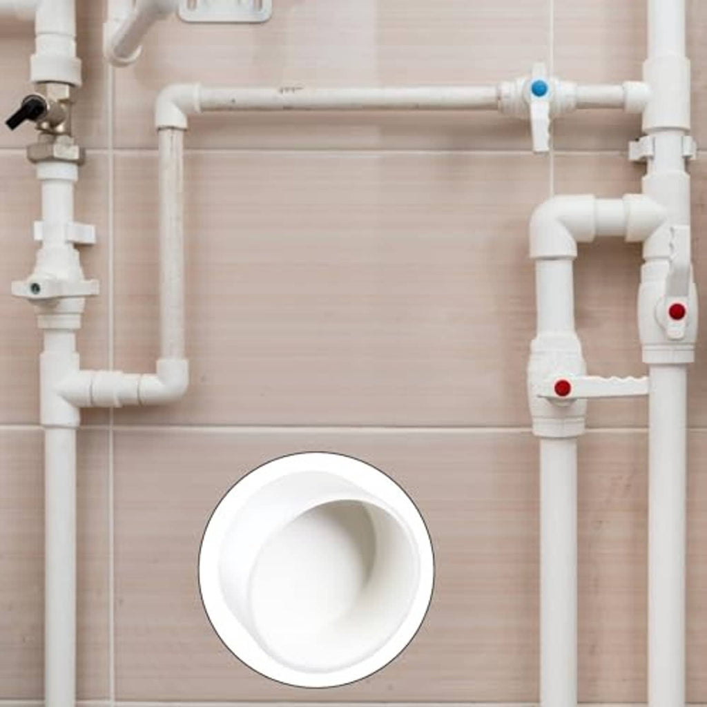 White round plastic end cap plug adapter installed on white pipe