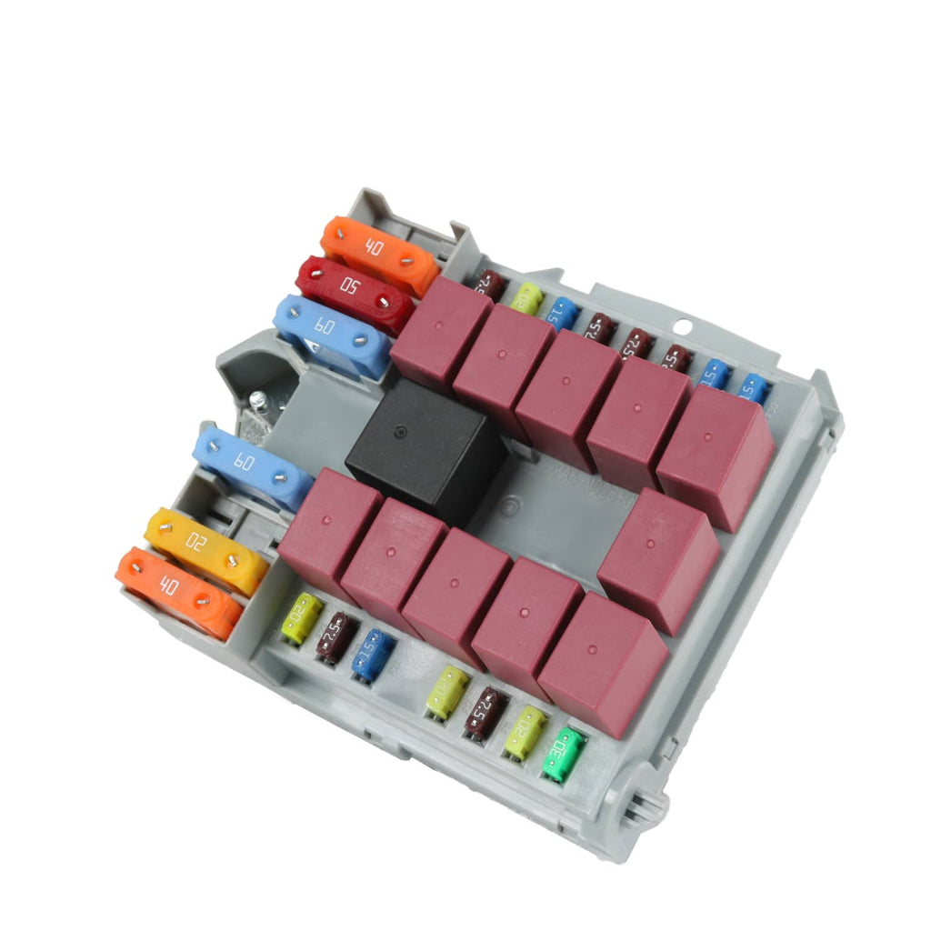 Power distribution center angled view with red rocker fuses and mixed-color fuse positions