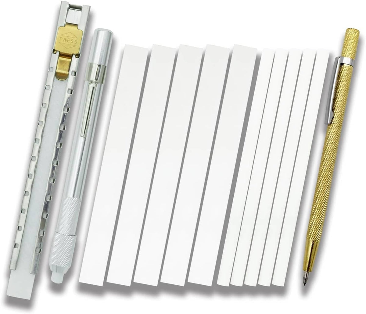 Soapstone holder set with white slotted strips and textured gold and silver pens