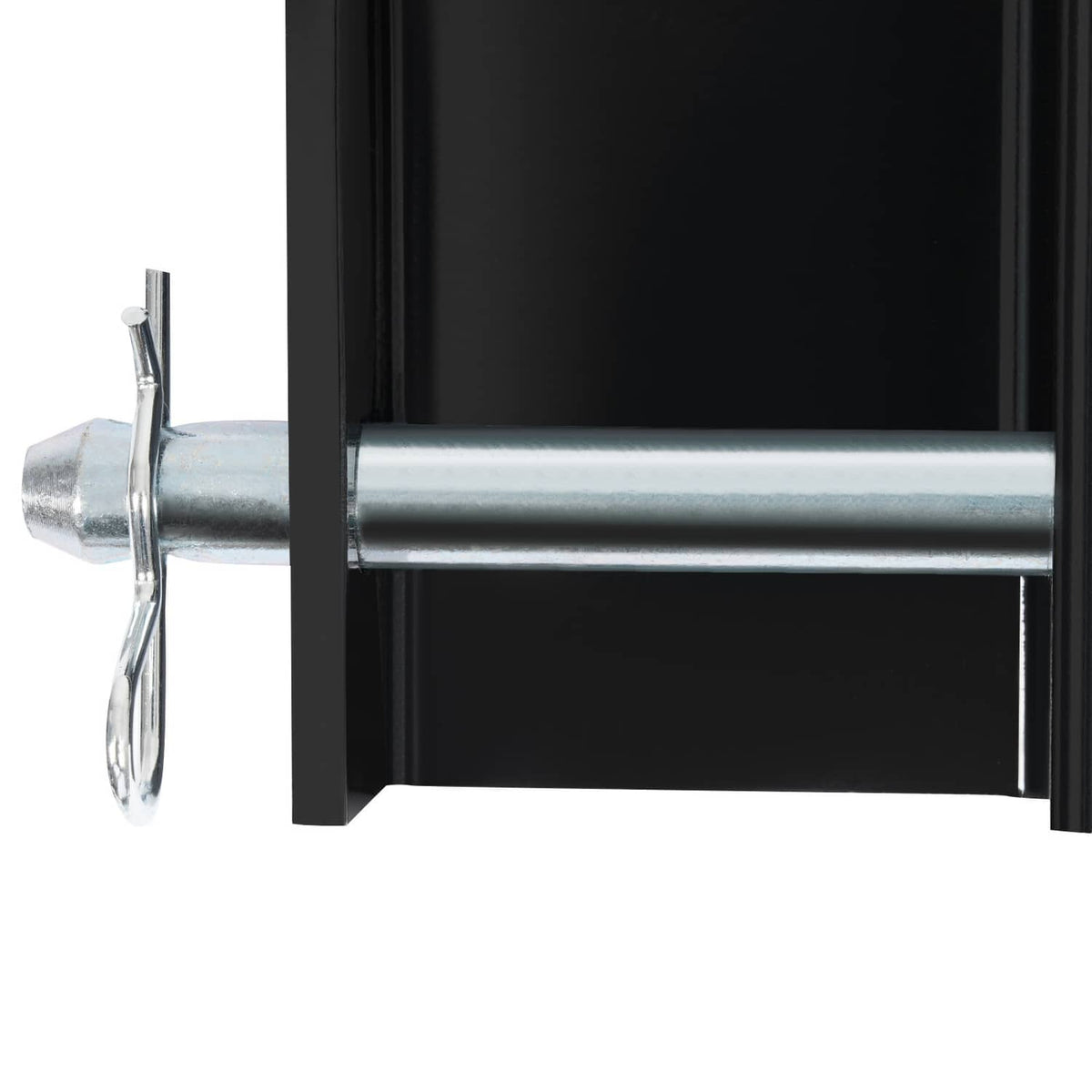 Close-up of black stake pocket with silver galvanized bar and mounting hardware
