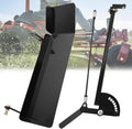 Black metal chute blocker with curved discharge shield and support frame for mower