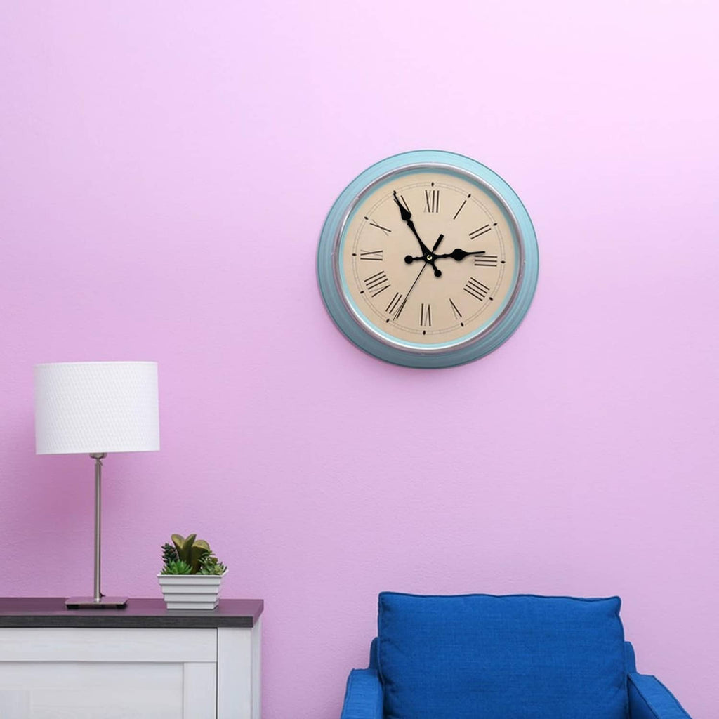 Wall clock with blue frame, white dial, and black hands with Roman numerals