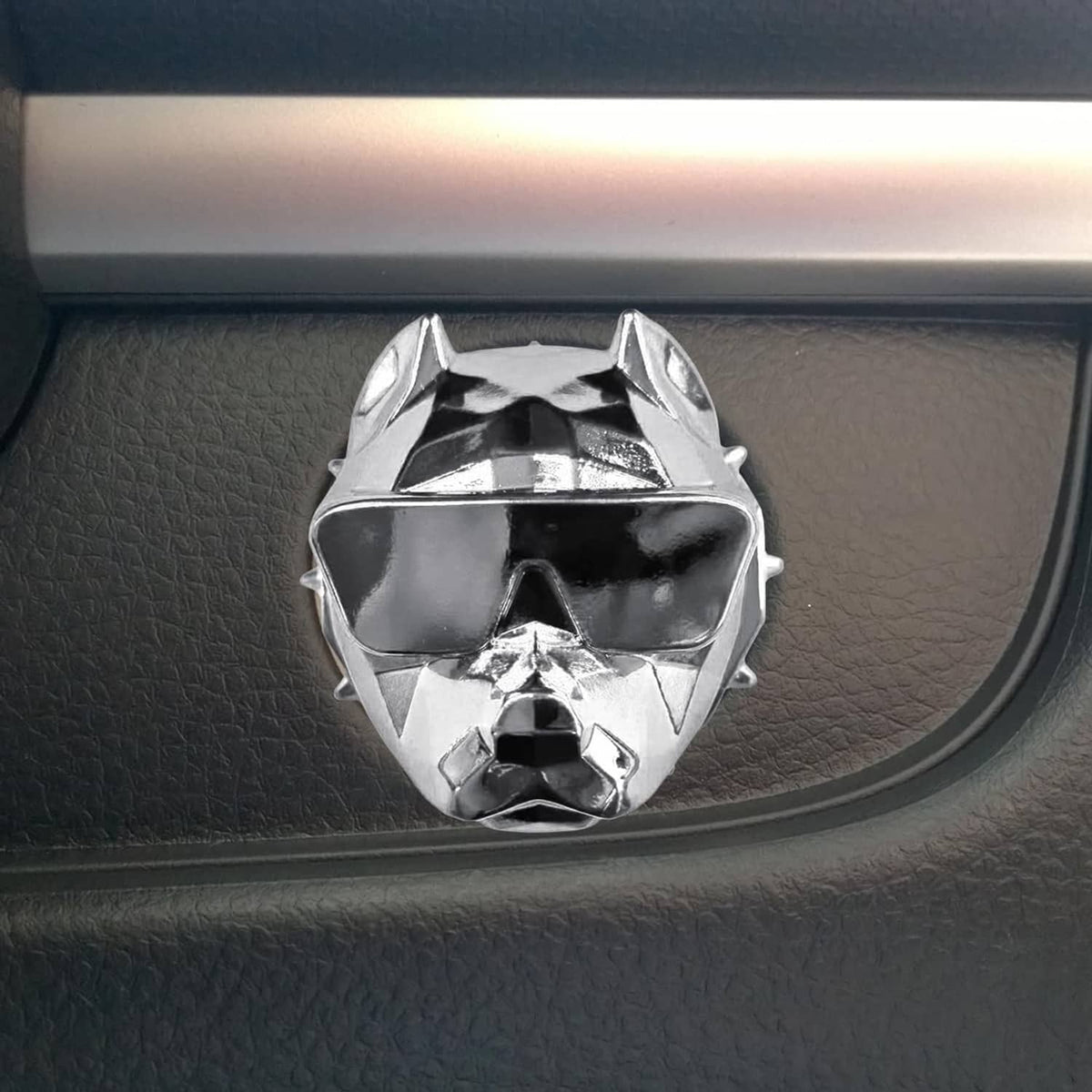 Silver zinc alloy push-start button cover with bulldog face design on textured trim
