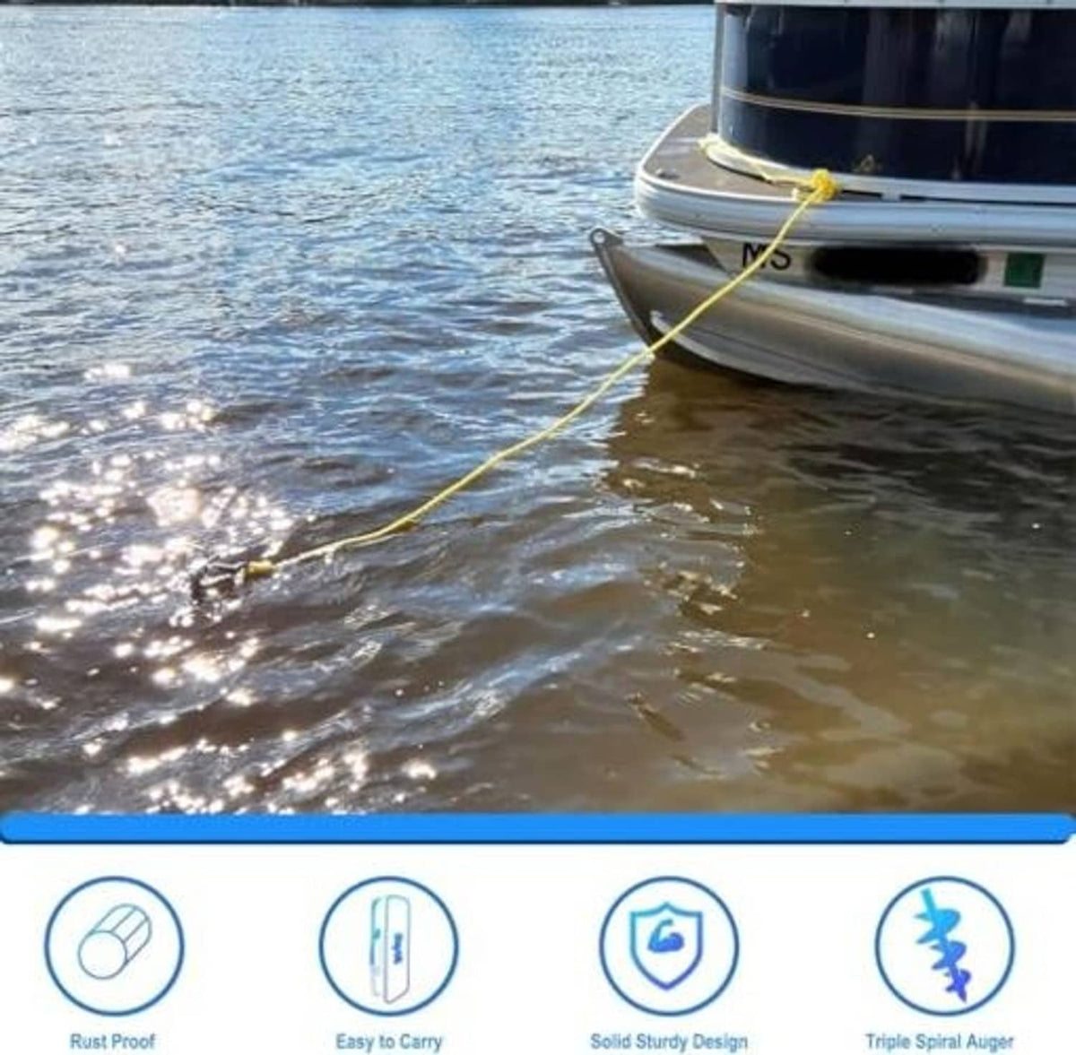 Sand anchor tethered by yellow rope near a boat hull on calm water