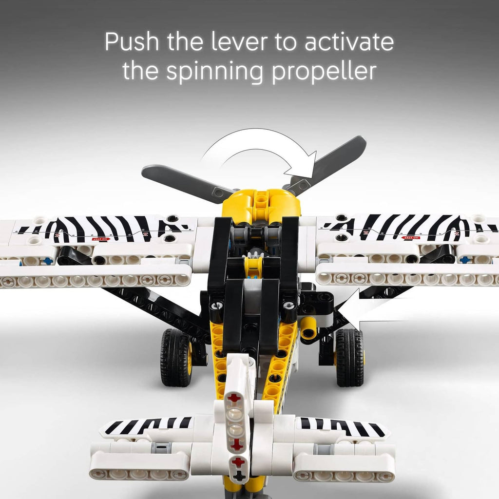 LEGO Technic bush plane toy close-up of spinning propeller with yellow hub