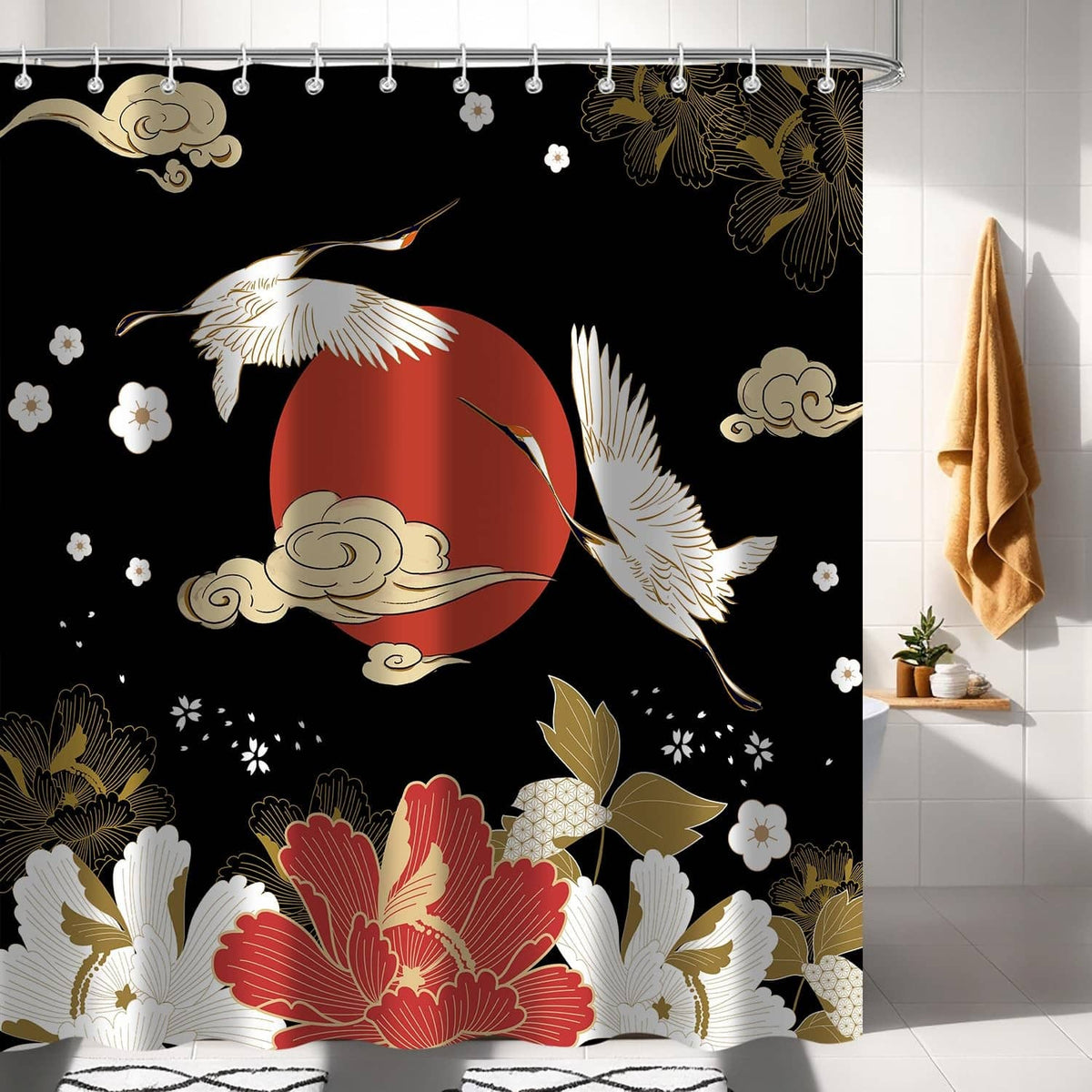 Black shower curtain with gold cranes, red sun, and white flowers; curtain rod hooks