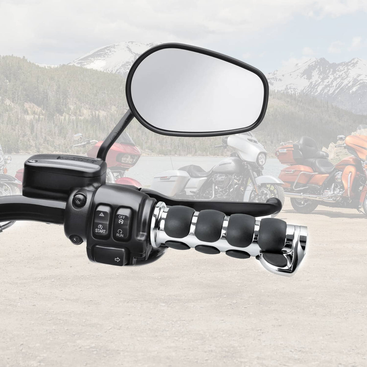 Motorcycle handlebar hand grips installed: black pads with chrome rings
